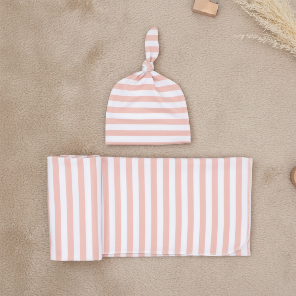 The SnuggleNest Newborn Wrap and Cap Set