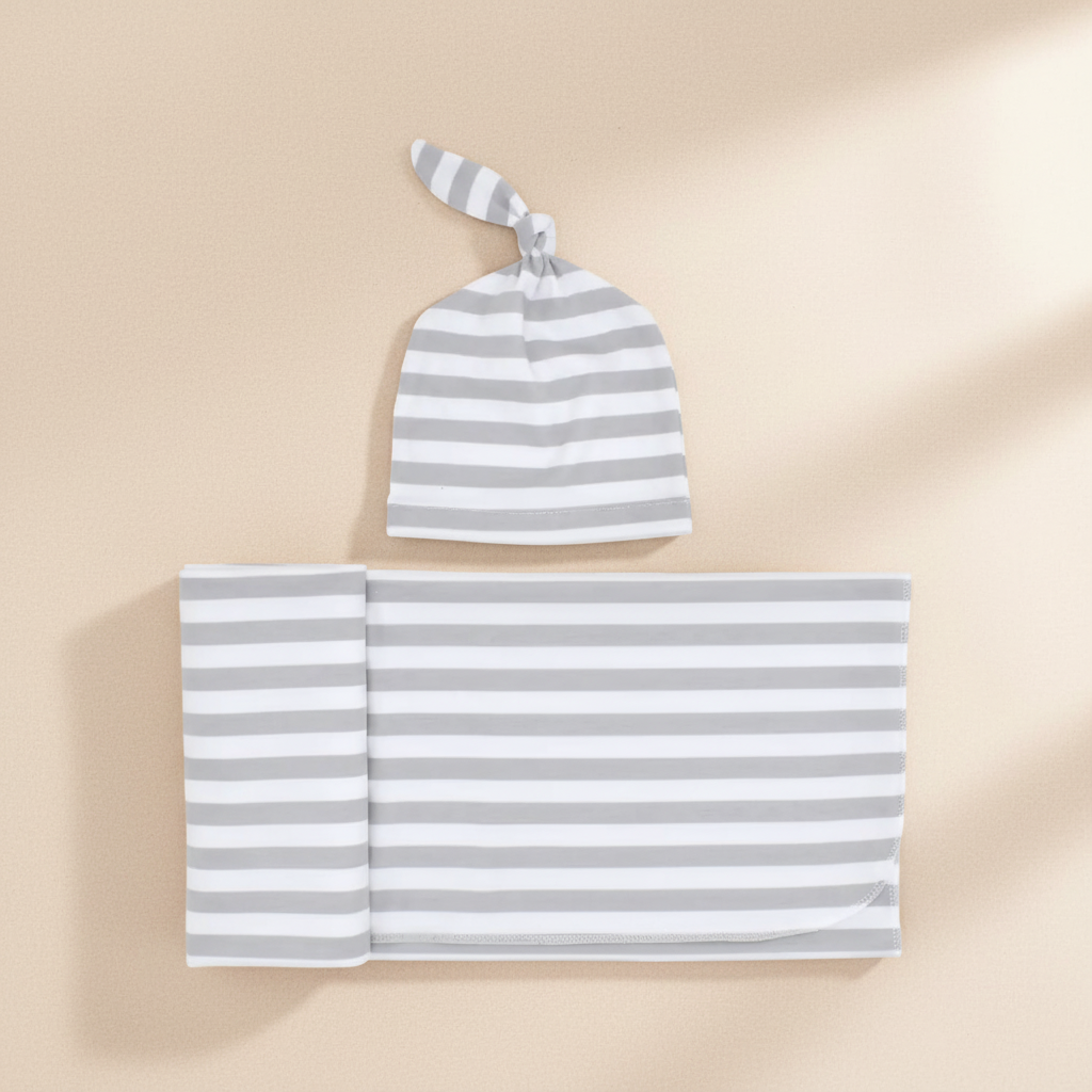 The SnuggleNest Newborn Wrap and Cap Set